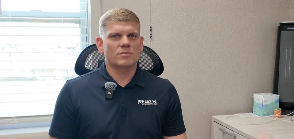 Josh Herzog, CEO of Herzog Roofing, during an interview