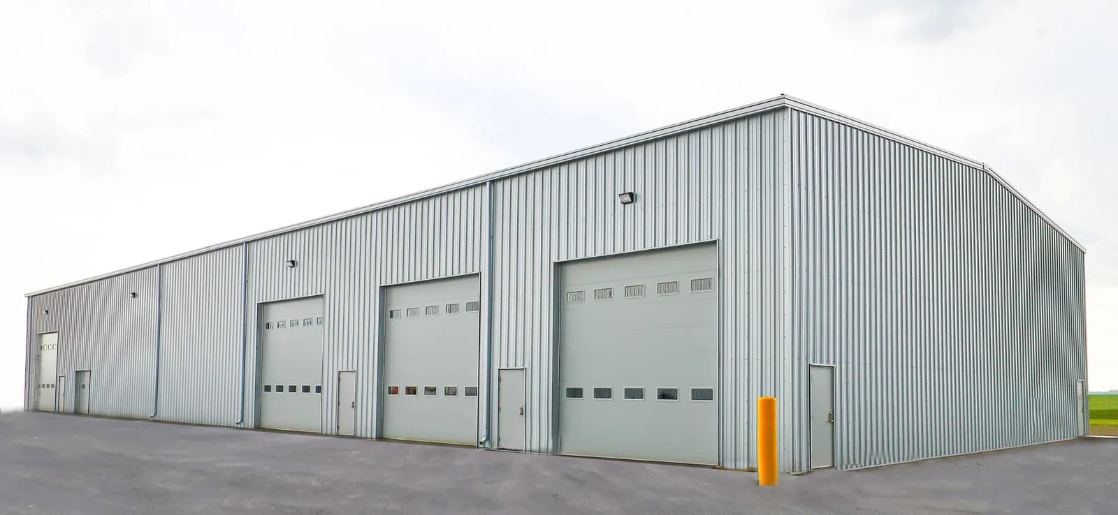New 80 by 25 by 180 foot insulated steel shop