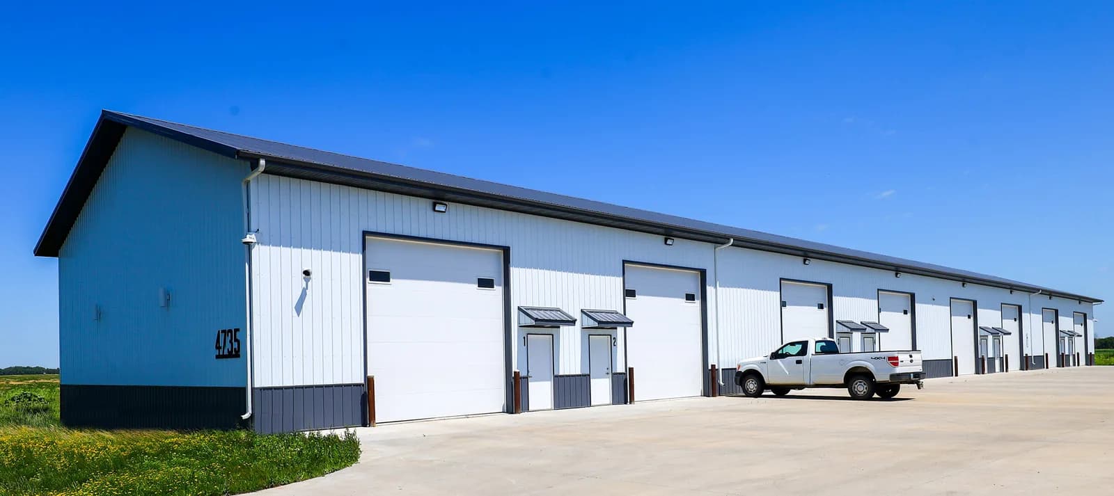 Several large post-frame shop buildings